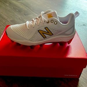 Brand New women’s softball cleats - never worn